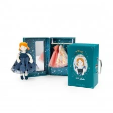 Suitcase with clothes and a soft doll