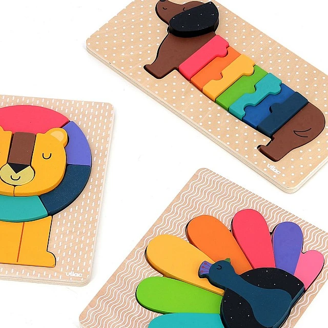 Wooden peacock puzzle designed by Andy Westface