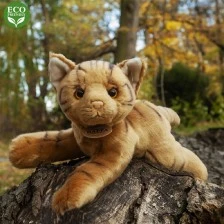 Plush cat lying down 30 cm.