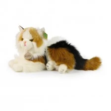 Plush Tricolor cat lying down 30 cm.