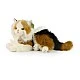 Plush Tricolor cat lying down 30 cm.